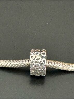 Pandora Retired Swirl Clip Charm in 925 Sterling Silver